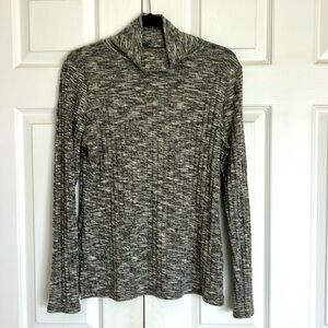 Lightweight sweater with a mix of brown, gray and cream.